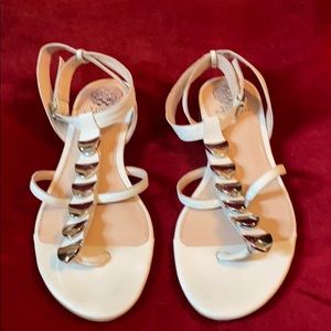 This is a white Vince Camuto sandals.